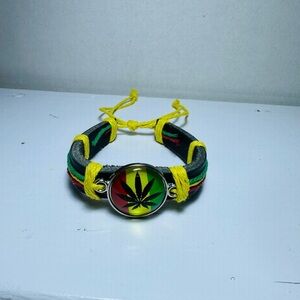 Handcrafted Rasta Bracelet with Leaf Emblem